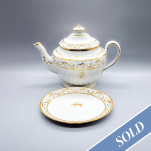 A rare New Hall wrythen-moulded teapot and stand, circa 1800