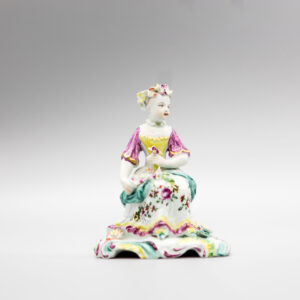 A Derby ‘pale family’ figure representative of Spring, circa 1758