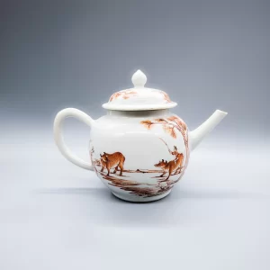 A Chinese porcelain teapot, enamelled in sepia with the ‘Boy on a Buffalo’ pattern, circa 1750