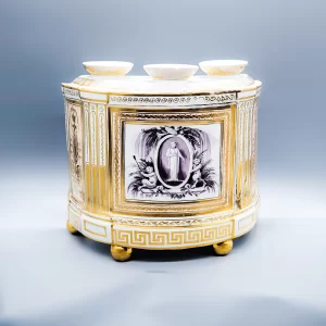 A Coalport bough pot and cover, on four ball feet, circa 1805