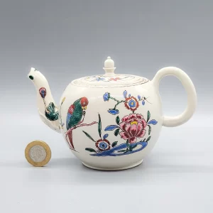 A small Staffordshire saltglazed stoneware teapot and cover, circa 1760
