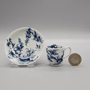 A Worcester miniature or toy coffee cup and saucer, circa 1760-62