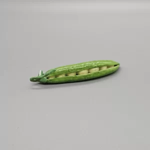 A porcelain pod of peas, probably Minton, circa 1830