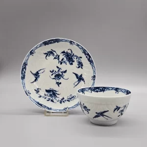 A Worcester feather-moulded teabowl and saucer, circa 1760