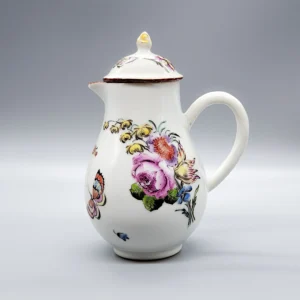 A Chinese jug and cover, decorated in London, circa 1750
